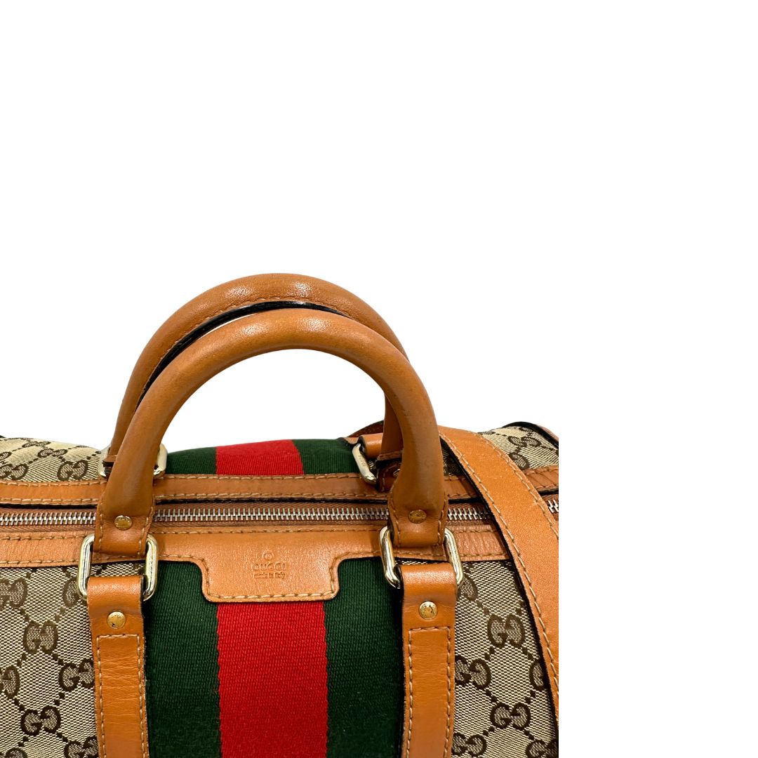 Bauletto Gucci Boston trama GG, impreziosito da striscia Web verde e rossa, di lusso, originale, discrete condizioni, usato