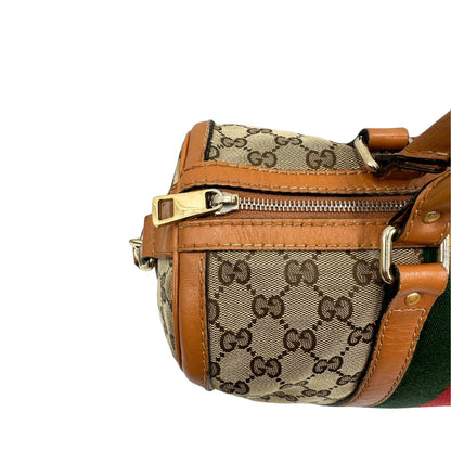 Bauletto Gucci Boston trama GG, impreziosito da striscia Web verde e rossa, di lusso, originale, discrete condizioni, usato
