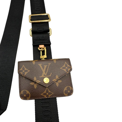 Accessorio tracolla Louis Vuitton realizzato in tessuto nero munito di portamonete in tela monogram