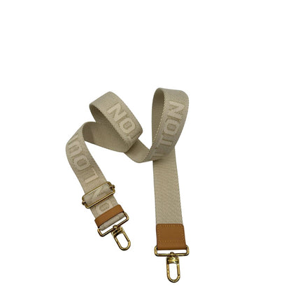 Accessorio tracolla Louis Vuitton realizzato in tessuto beige chiaro con finiture in vacchetta naturale e inserti metallici dorati. Originale, usato, di lusso, in condizioni eccellenti.