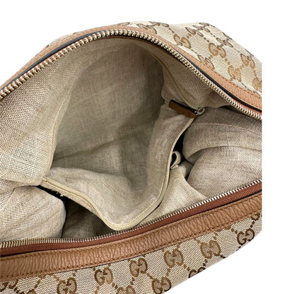 Interno tasca, Borsa Gucci GG in tessuto e pelle marrone; munita di un manico singolo, indossabile a spalla. Originale, usata, di lusso, in buone condizioni.