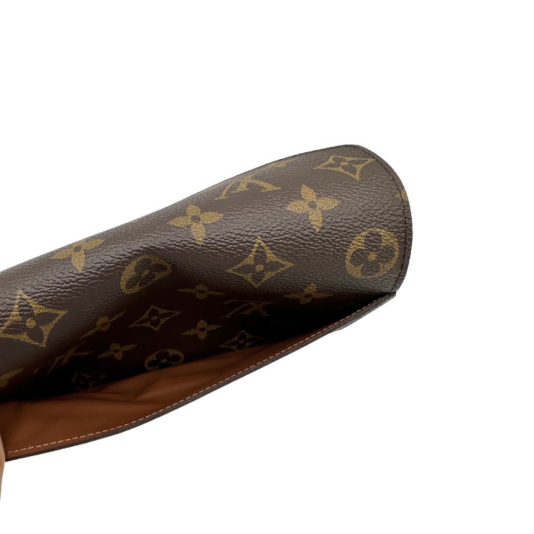 Tasca, Portafoglio Louis Vuitton Sarah in canvas monogrammato marrone, con parti metalliche dorate. Originale, usato, di lusso, in condizioni eccellenti.