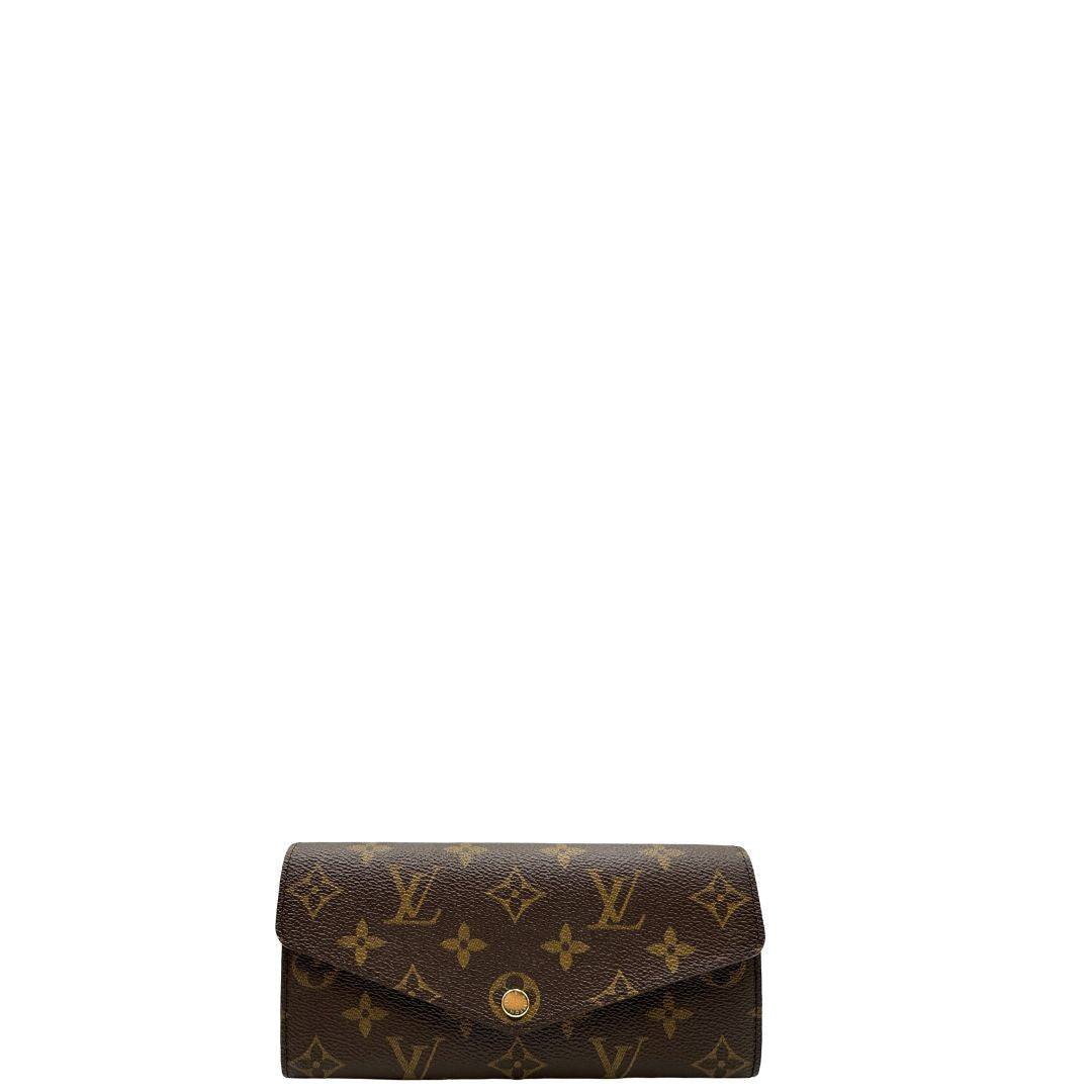 Front, Portafoglio Louis Vuitton Sarah in canvas monogrammato marrone, con parti metalliche dorate. Originale, usato, di lusso, in condizioni eccellenti.