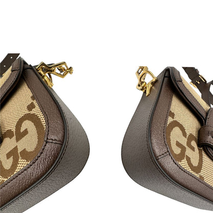 Borsa Gucci in tessuto beige con il monogramma in versione “Jumbo” e finiture in pelle marroni, munita di doppie tracolle, una in pelle amovibile e regolabile e una in tessuto Web verde e rosso amovibile e regolabile, di lusso, originale, eccellenti condizioni, usata