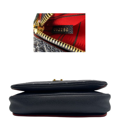 Codice, Base, Borsa Louis Vuitton Métis in pelle monogram empreinte blu notte con parti metalliche dorate. Munita di un manico e tracolla regolabile con fibbia e amovibile. Originale, usata, di lusso, in ottime condizioni.