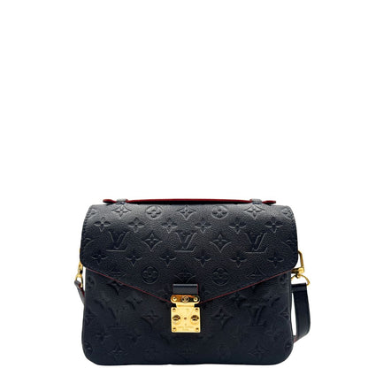 Front, Borsa Louis Vuitton Métis in pelle monogram empreinte blu notte con parti metalliche dorate. Munita di un manico e tracolla regolabile con fibbia e amovibile. Originale, usata, di lusso, in ottime condizioni.