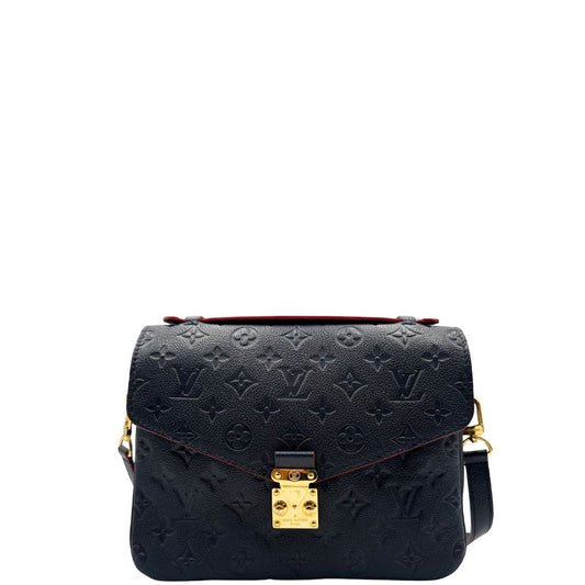 Front, Borsa Louis Vuitton Métis in pelle monogram empreinte blu notte con parti metalliche dorate. Munita di un manico e tracolla regolabile con fibbia e amovibile. Originale, usata, di lusso, in ottime condizioni.