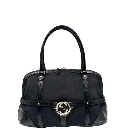 front  Borsa Gucci in tessuto nero con finiture in pelle traforata, indossabile a spalla, di lusso, originale, ottime condizioni 