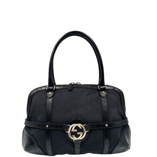 front  Borsa Gucci in tessuto nero con finiture in pelle traforata, indossabile a spalla, di lusso, originale, ottime condizioni 