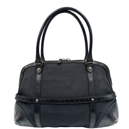 retro  Borsa Gucci in tessuto nero con finiture in pelle traforata, indossabile a spalla, di lusso, originale, ottime condizioni 