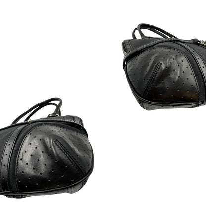 angoli  Borsa Gucci in tessuto nero con finiture in pelle traforata, indossabile a spalla, di lusso, originale, ottime condizioni 