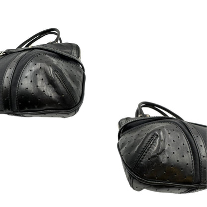 angoli  Borsa Gucci in tessuto nero con finiture in pelle traforata, indossabile a spalla, di lusso, originale, ottime condizioni 