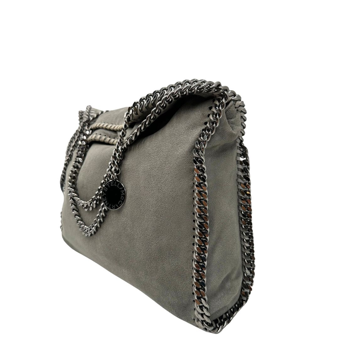 lato  Borsa Stella McCartney modello Fold Over Tote realizzata in shaggy dear grigia, di lusso, originale, usata 