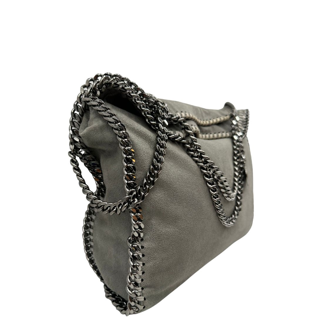 lato  Borsa Stella McCartney modello Fold Over Tote realizzata in shaggy dear grigia, di lusso, originale, usata 
