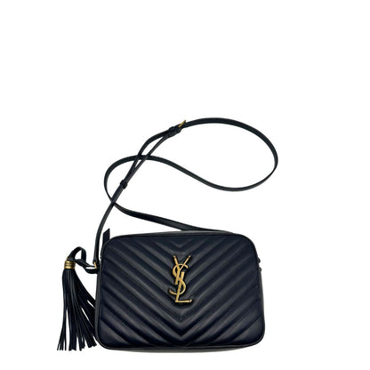 Front di una borsa Saint Laurent blu navy con iconico logo centrale YSL, caratterizzata da impunture trapuntate ad “y” e nappa decorativa, usata, originale, second hand, in ottime condizioni.