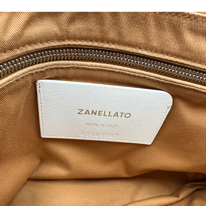 Interno, Postina S Zanellato color nocciola munita di una tracolla amovibile e regolabile e un manico singolo. Originale, usata, di lusso, in ottime condizioni.
