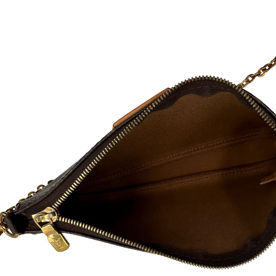 Multi Pochette Accessoires Louis Vuitton in canvas marrone monogram con dettagli in vacchetta naturale, manico in catena dorata e tracolla in tessuto Jacquard verde kaki, di lusso, originale, ottime condizioni, usata