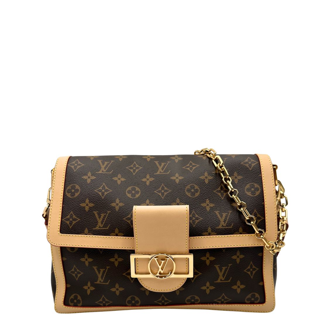 Front, Borsa Louis Vuitton Dauphine Soft in canvas marrone monogram con finiture in vacchetta naturale e parti metalliche dorate. Originale, usata, di lusso, in ottime condizioni.