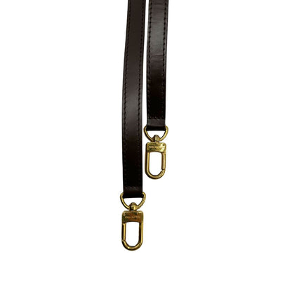 Accessorio tracolla Louis Vuitton realizzato in pelle marrone regolabile con fibbia. Originale, usata, di lusso, in condizioni eccellenti.