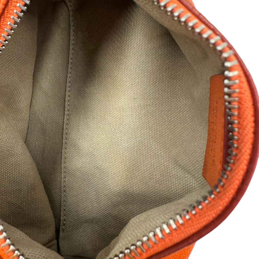 interno della Pochette Givenchy in pelle arancione 