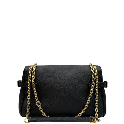 retro Borsa Louis Vuitton Anytime realizzata nell'iconica pelle Monogram Empreinte nera e impreziosita dall'elegante catenella scorrevole dorata, di lusso, originale, eccellenti condizioni. 