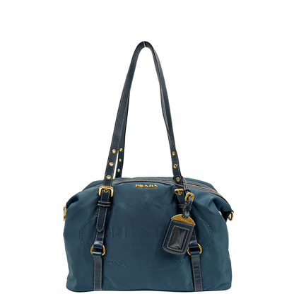 front Borsa Prada in nylon color blu petrolio, finiture in pelle saffiano tono su tono e hardware dorato, di lusso, originale, ottime condizioni, usata 