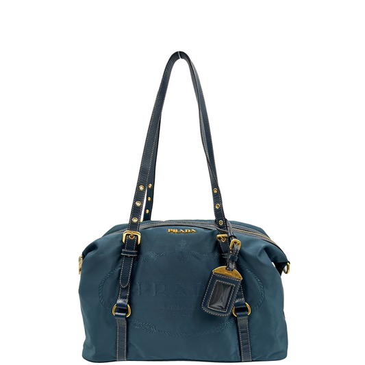 front Borsa Prada in nylon color blu petrolio, finiture in pelle saffiano tono su tono e hardware dorato, di lusso, originale, ottime condizioni, usata 