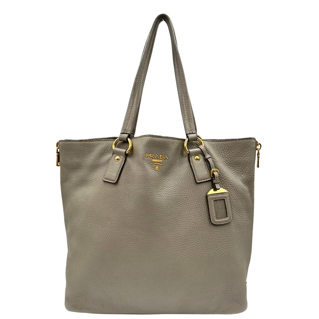 front Borsa Prada in pelle grigia, dotata di doppi manici, dettagli in metallo dorato, di lusso, originale, ottime condizioni, usata 