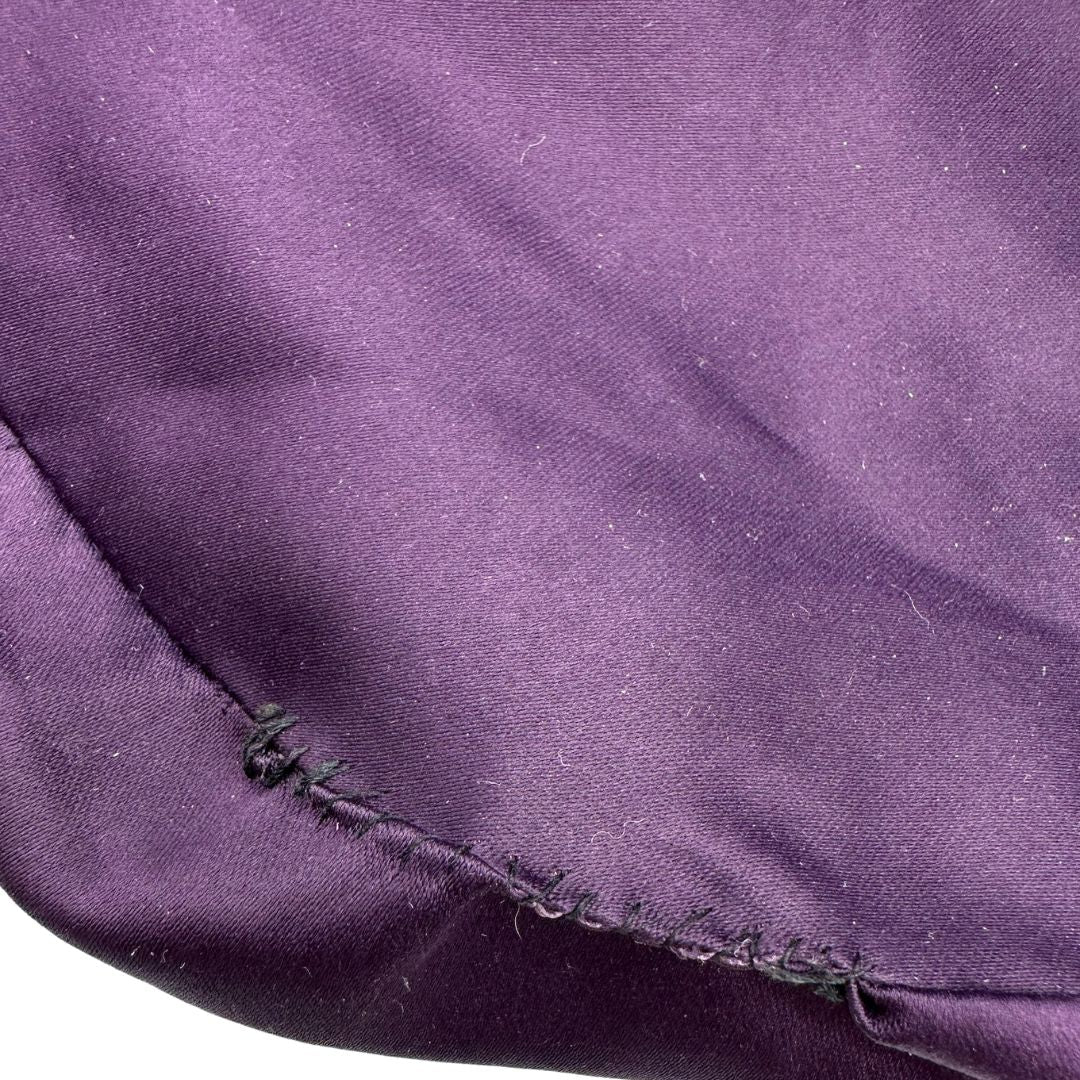 interno della borsa Miu Miu realizzata in pelle color viola melanzana con lavorazione matelassé, caratterizzata da morbide arricciature, di lusso, originale, ottime condizioni, usata