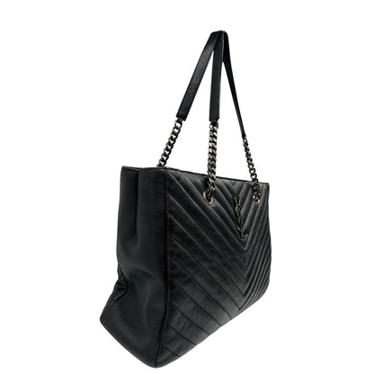 lato della   Borsa Saint Laurent in pelle nera con impunture trapuntate chevron, di lusso, originale, ottime condizioni, usata  