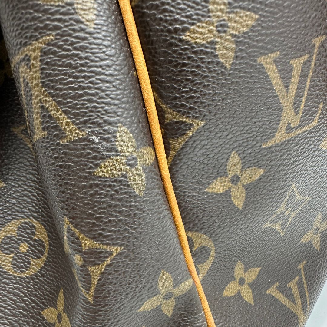  Borsa LV in canvas marrone monogram con finiture in vacchetta naturale, di lusso, originale, buone condizioni.