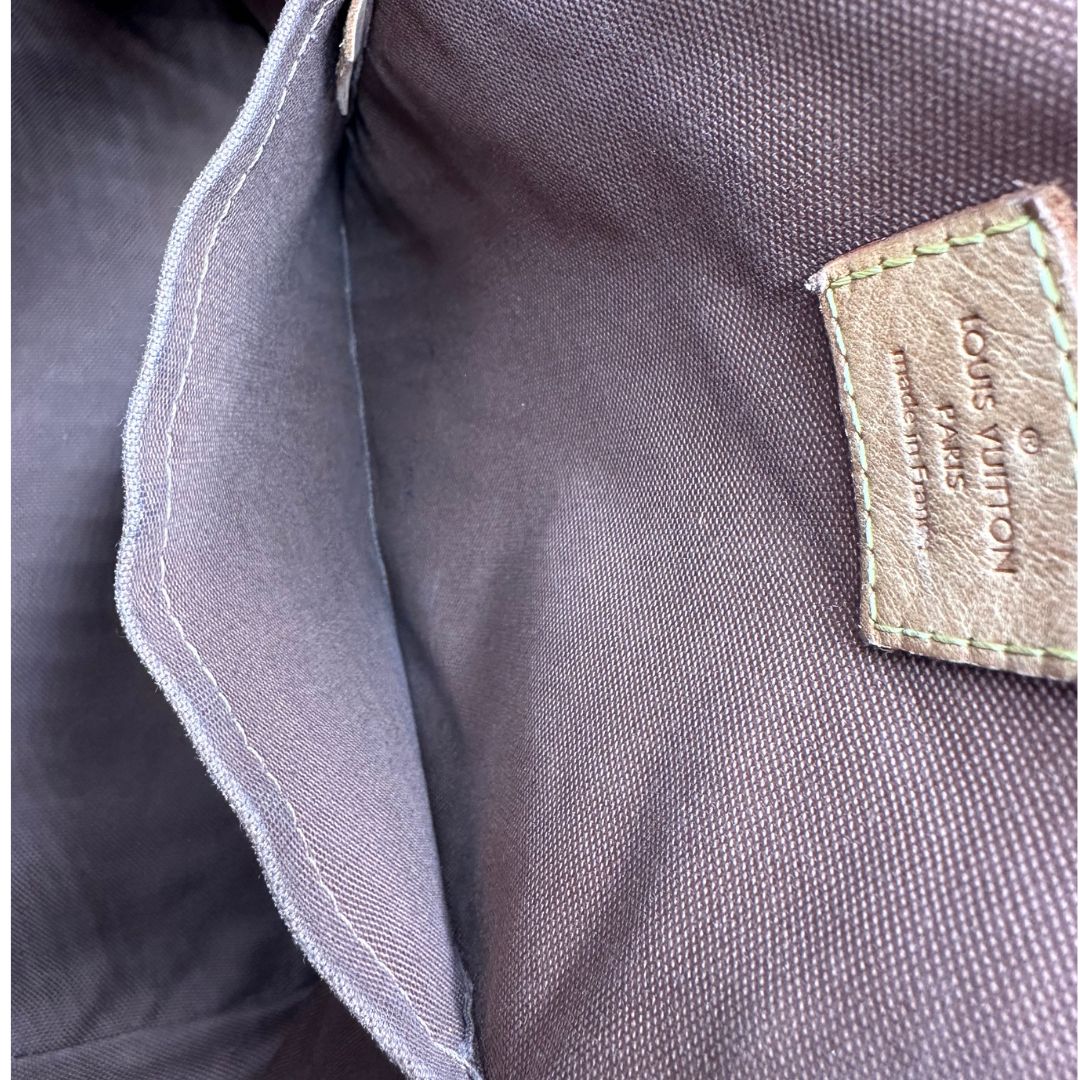 interno Borsa LV in canvas marrone monogram con finiture in vacchetta naturale, di lusso, originale, buone condizioni.
