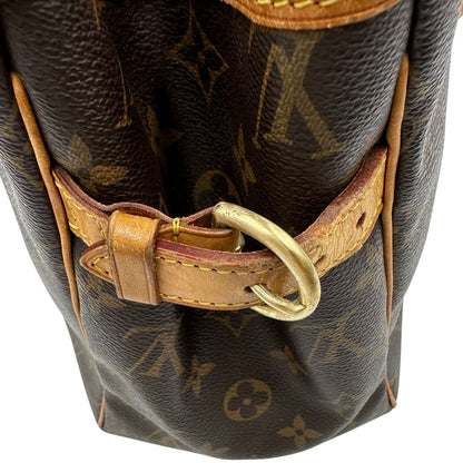  Borsa LV in canvas marrone monogram con finiture in vacchetta naturale, di lusso, originale, buone condizioni. 