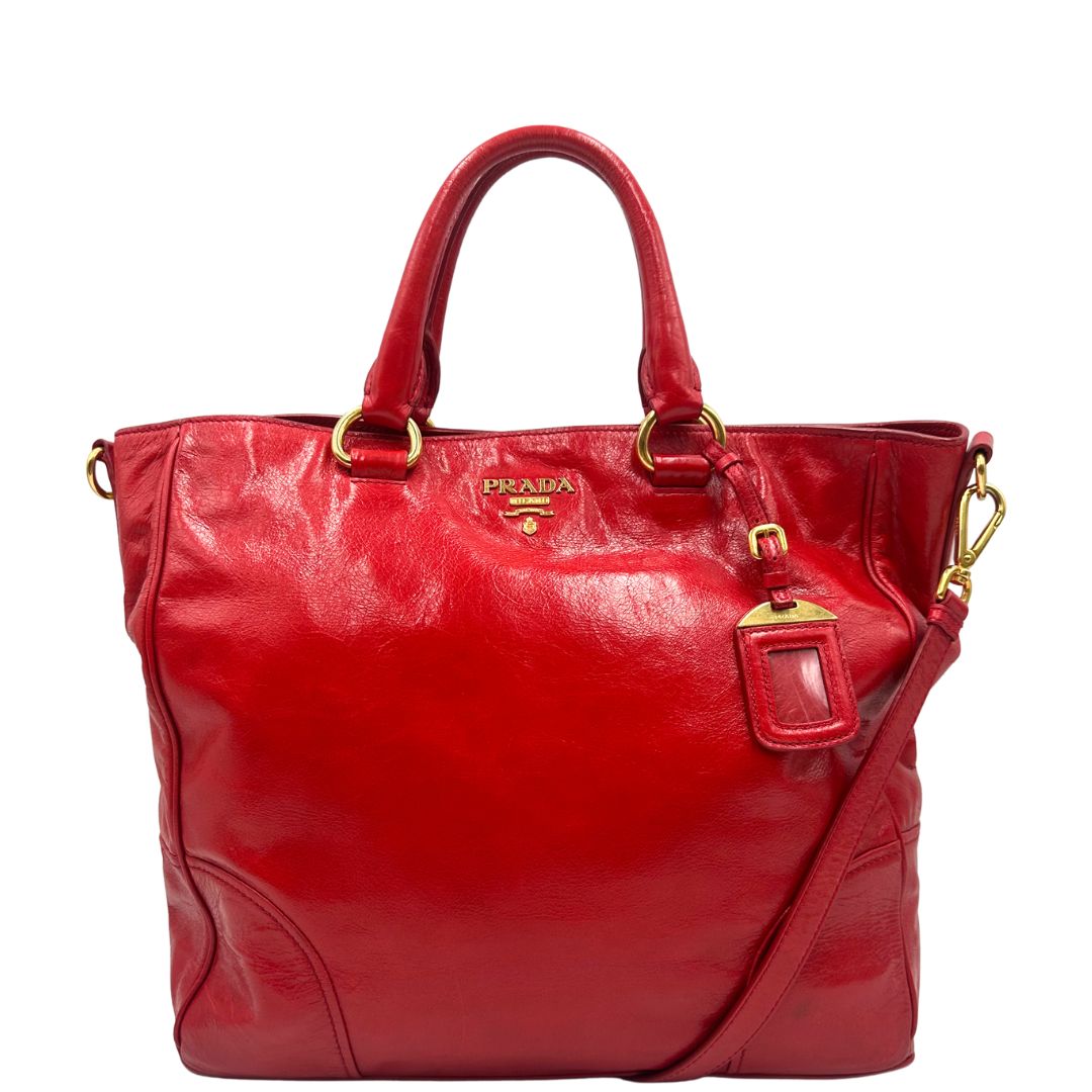 front Borsa Prada in pelle rossa munita di doppi manici stondati e una tracolla amovibile e regolabile, di lusso, originale, ottime condizioni, usata 