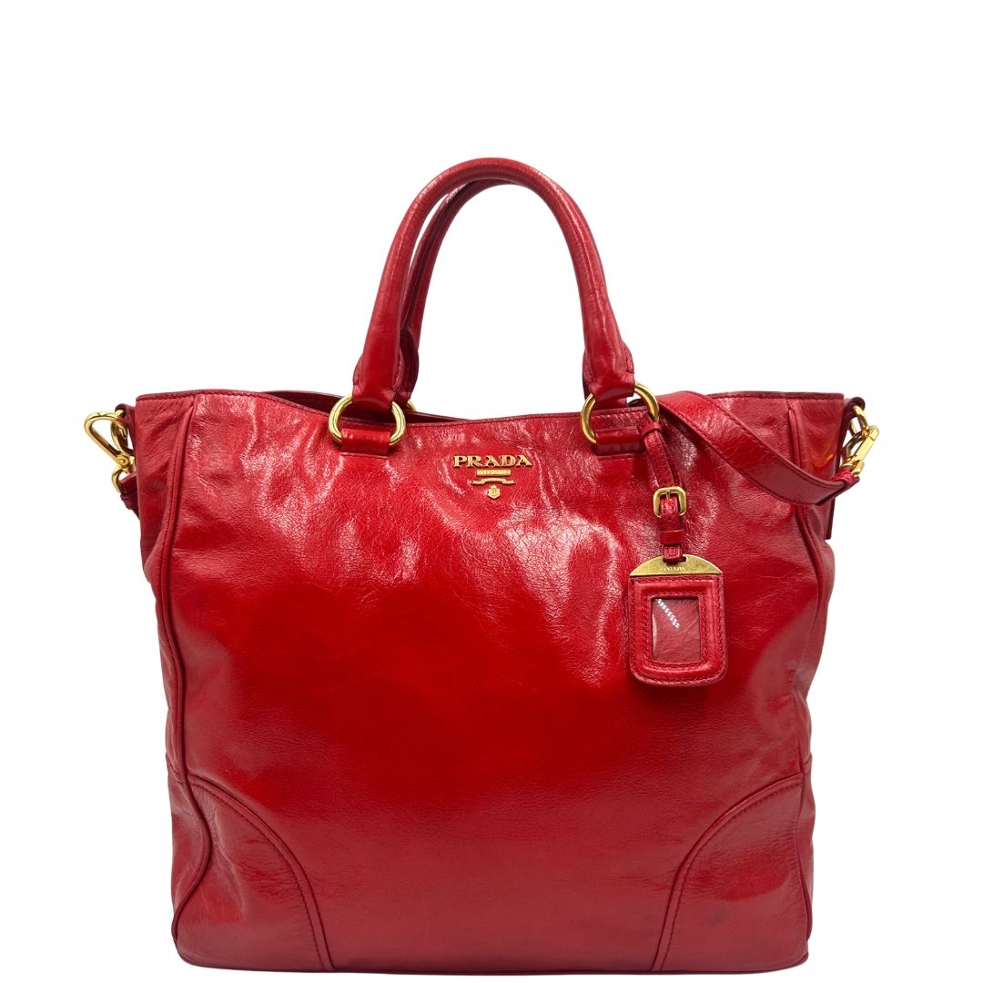 front Borsa Prada in pelle rossa munita di doppi manici stondati e una tracolla amovibile e regolabile, di lusso, originale, ottime condizioni, usata 