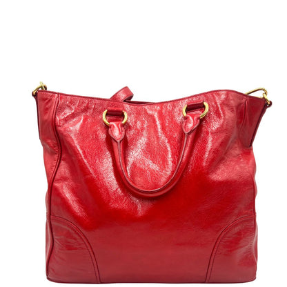 retro Borsa Prada in pelle rossa munita di doppi manici stondati e una tracolla amovibile e regolabile, di lusso, originale, ottime condizioni, usata 