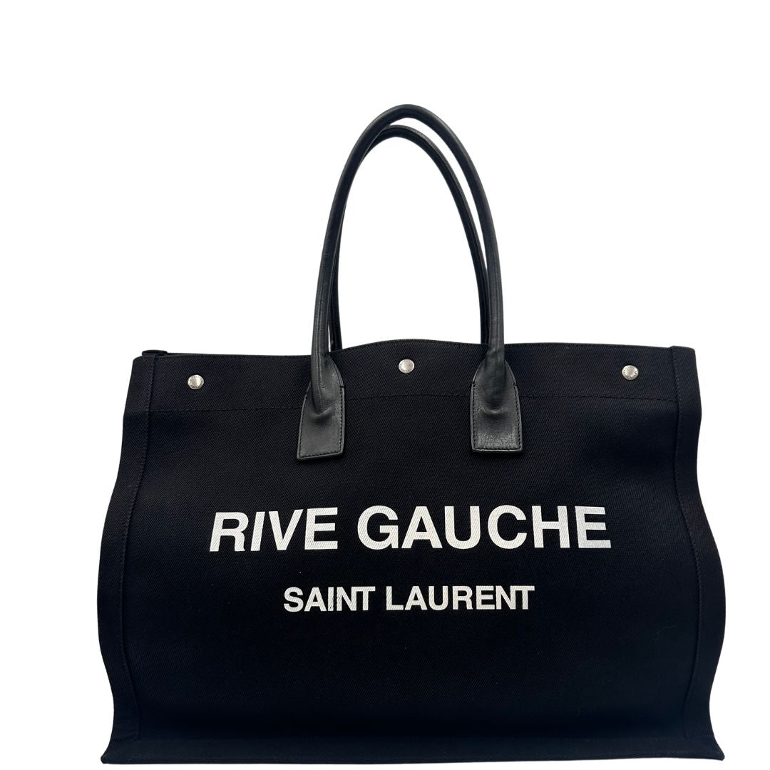 Borsa tote Saint Laurent Rive Gauche realizzata in tessuto nero con manici in pelle tono su tono, di lusso, originale , ottime condizioni, usata