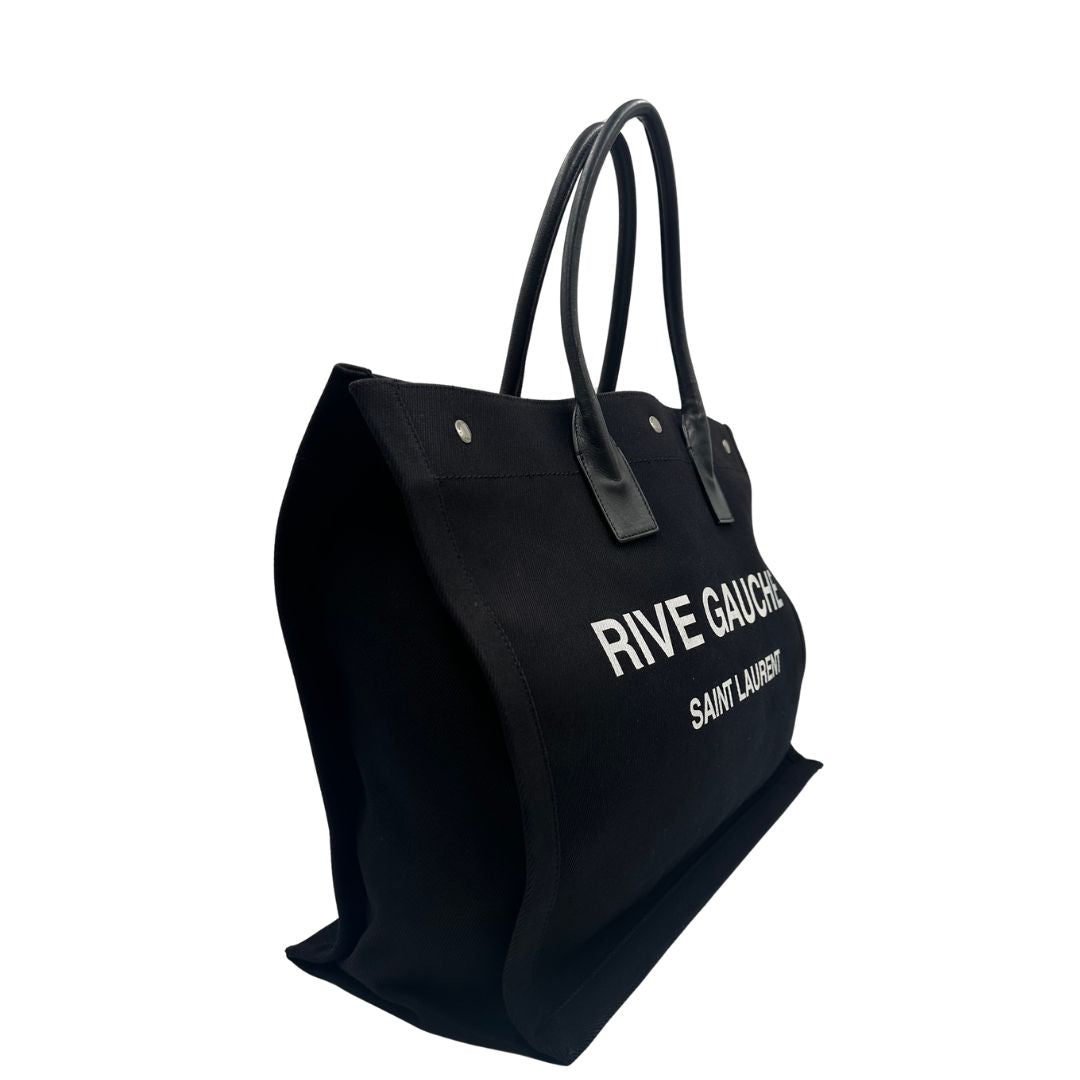 Borsa tote Saint Laurent Rive Gauche realizzata in tessuto nero con manici in pelle tono su tono, di lusso, originale , ottime condizioni, usata