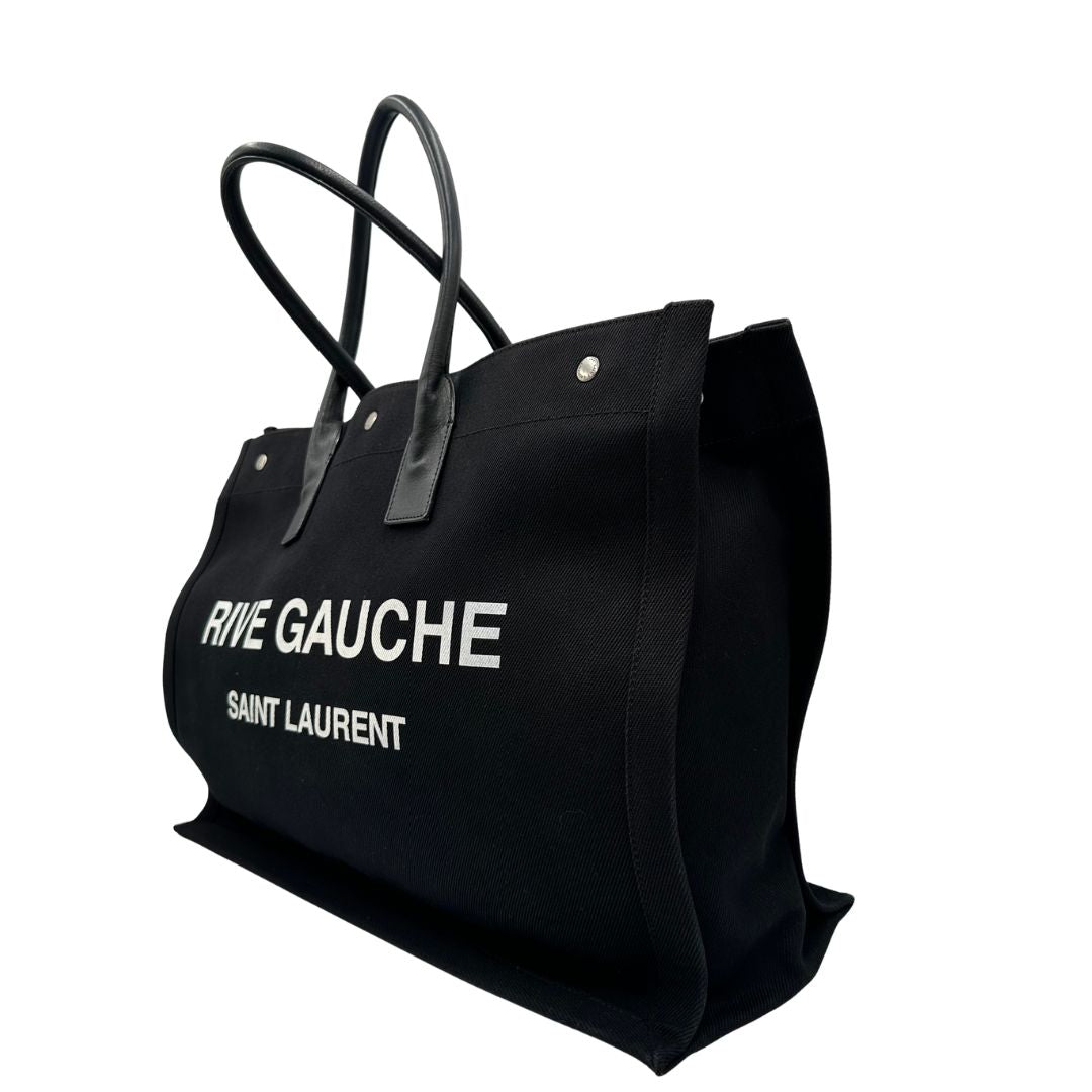 Borsa tote Saint Laurent Rive Gauche realizzata in tessuto nero con manici in pelle tono su tono, di lusso, originale , ottime condizioni, usata