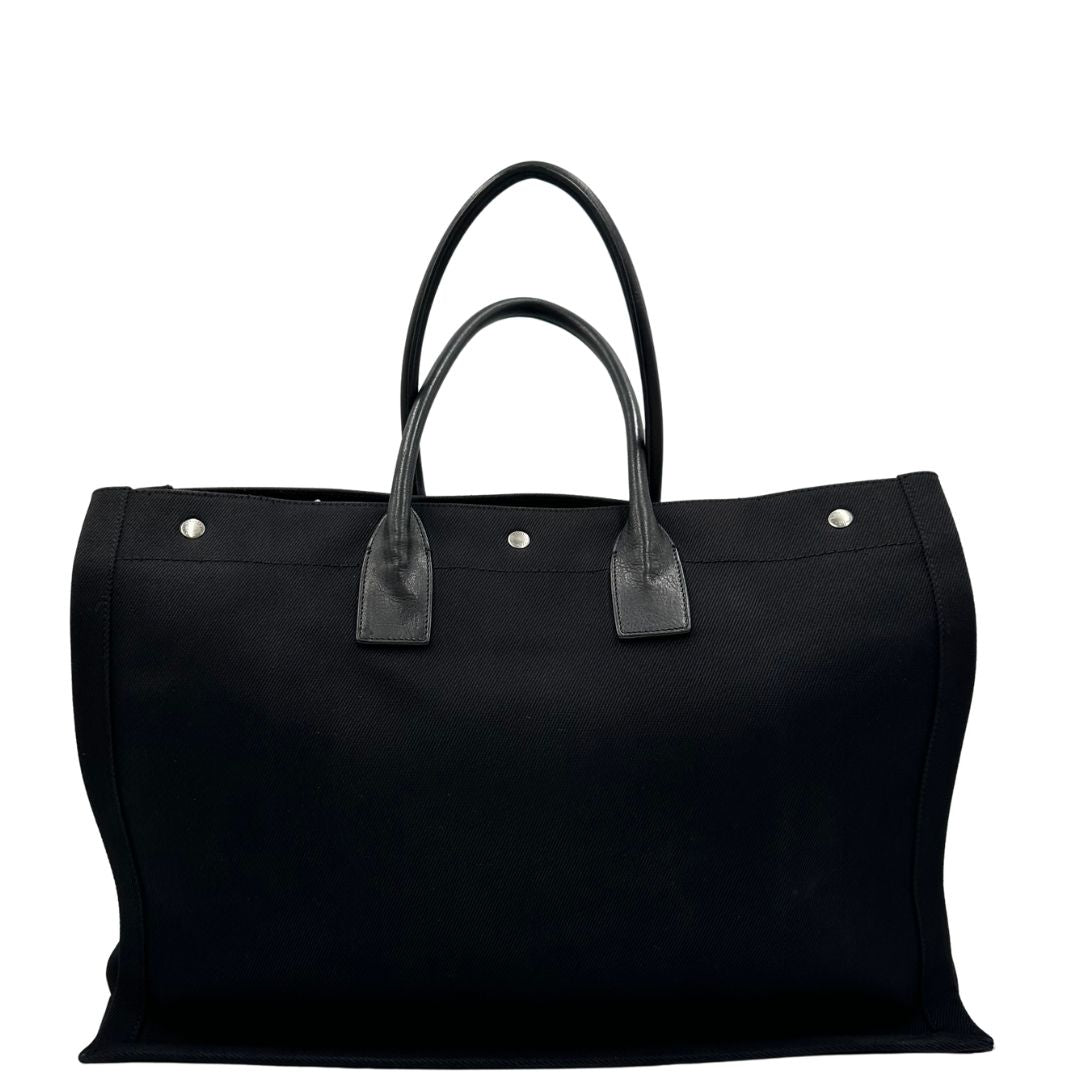 Borsa tote Saint Laurent Rive Gauche realizzata in tessuto nero con manici in pelle tono su tono, di lusso, originale , ottime condizioni, usata