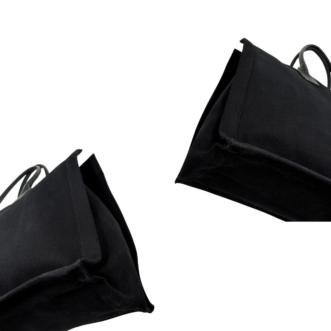 Borsa tote Saint Laurent Rive Gauche realizzata in tessuto nero con manici in pelle tono su tono, di lusso, originale , ottime condizioni, usata