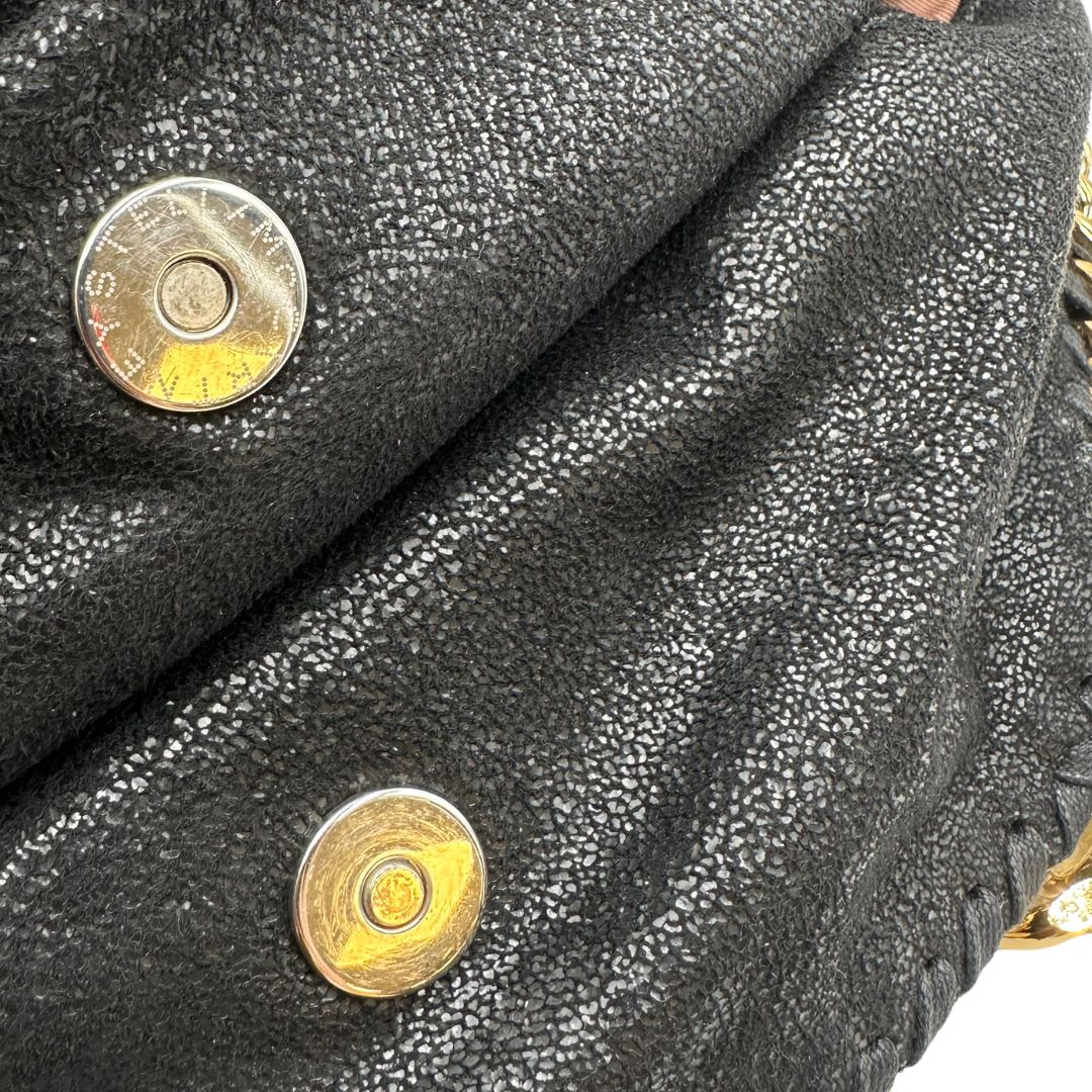  Borsa Falabella nella versione fold over tote nera, con hardware dorato e argentato, di lusso, originale, ottime condizioni, usata