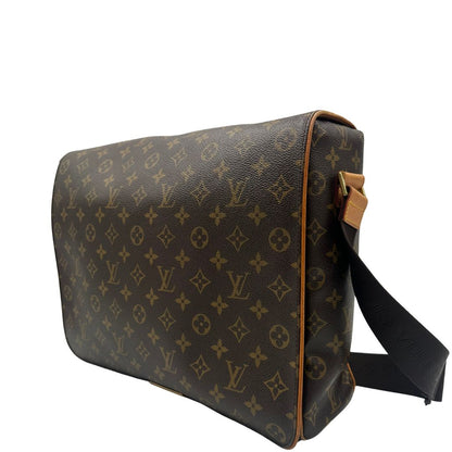 lato Cartella Louis Vuitton in canvas marrone monogram, munita di una tracolla in tessuto regolabile, di lusso, originale , ottime condizioni 