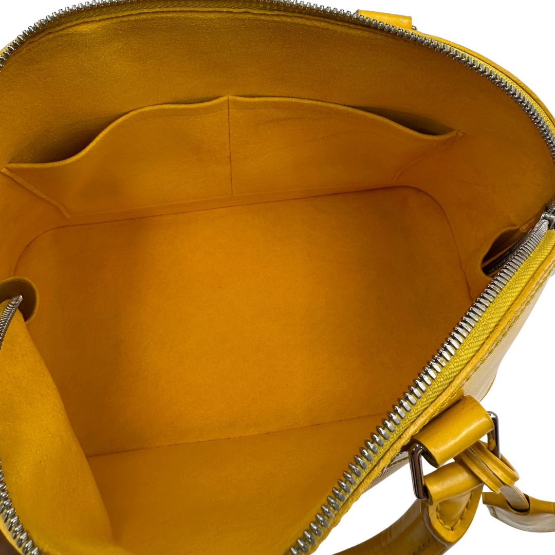 interno Louis Vuitton Alma in pelle epi gialla nella versione PM, di lusso, originale, ottime condizioni, usata