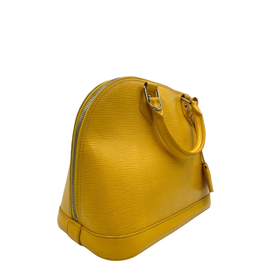 lato Louis Vuitton Alma in pelle epi gialla nella versione PM, di lusso, originale, ottime condizioni, usata 