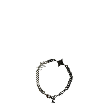 Bracciale Louis Vuitton in ottone argentato scuro e metallo con finitura chiara lucida, impreziosito da piccoli charm monogram