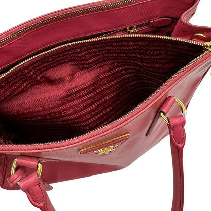  Borsa Prada in pelle saffiano color rosa fragola con hardware dorato, di lusso, originale, ottime condizioni, usata