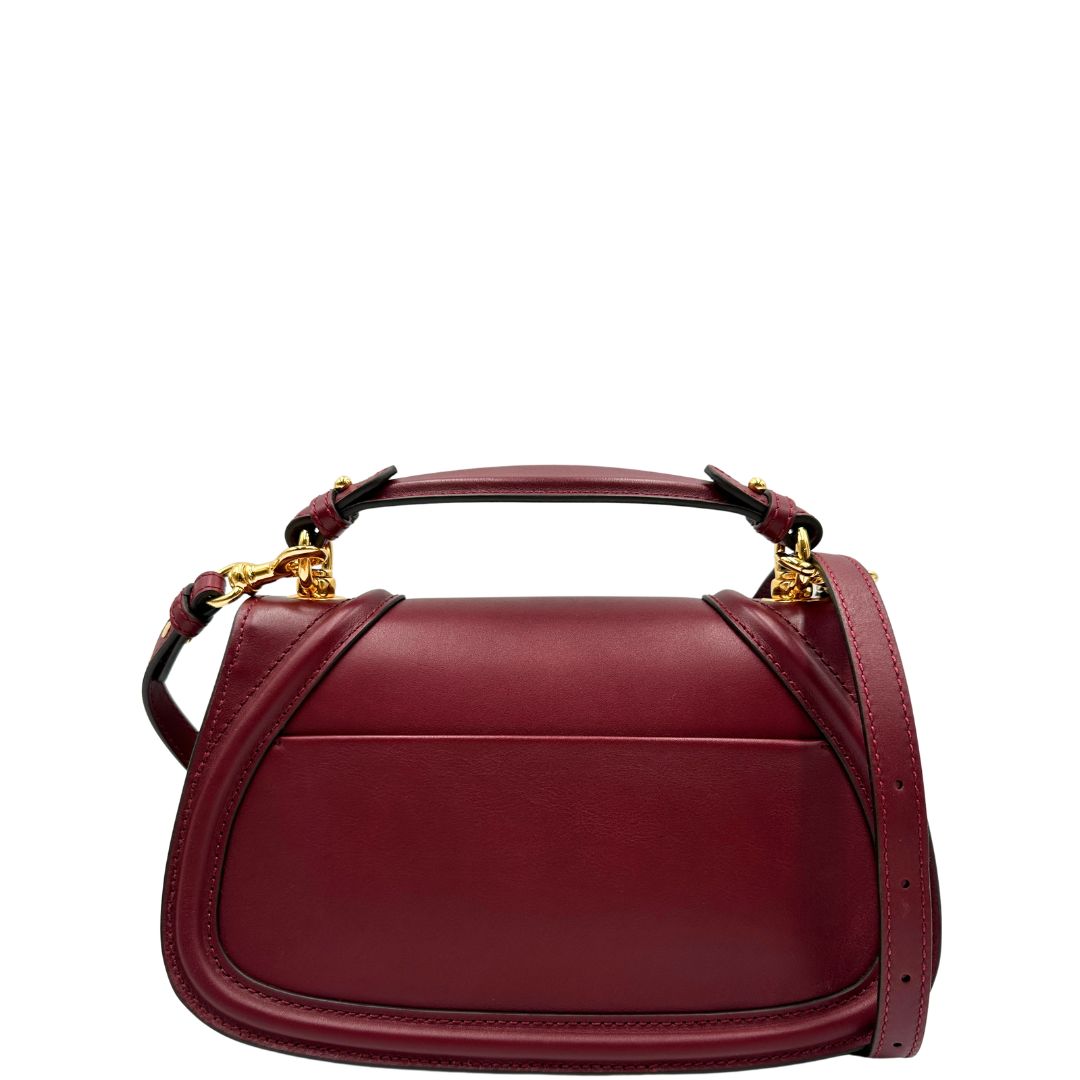 retro Borsa Gucci in pelle bordeaux con iconica doppia G sul front, di lusso, eccellenti condizioni, usata 