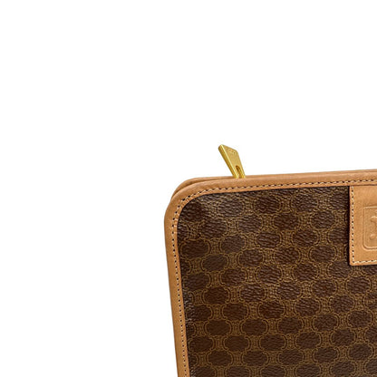 Pratica pochete Celine in canvas marrone con finiture in vacchetta.
