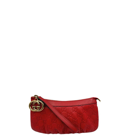 Front, Pochette Gucci in pelle rossa con trama Guccissima, da poratre a mano. Originale, usata, di lusso, in ottime condizioni.